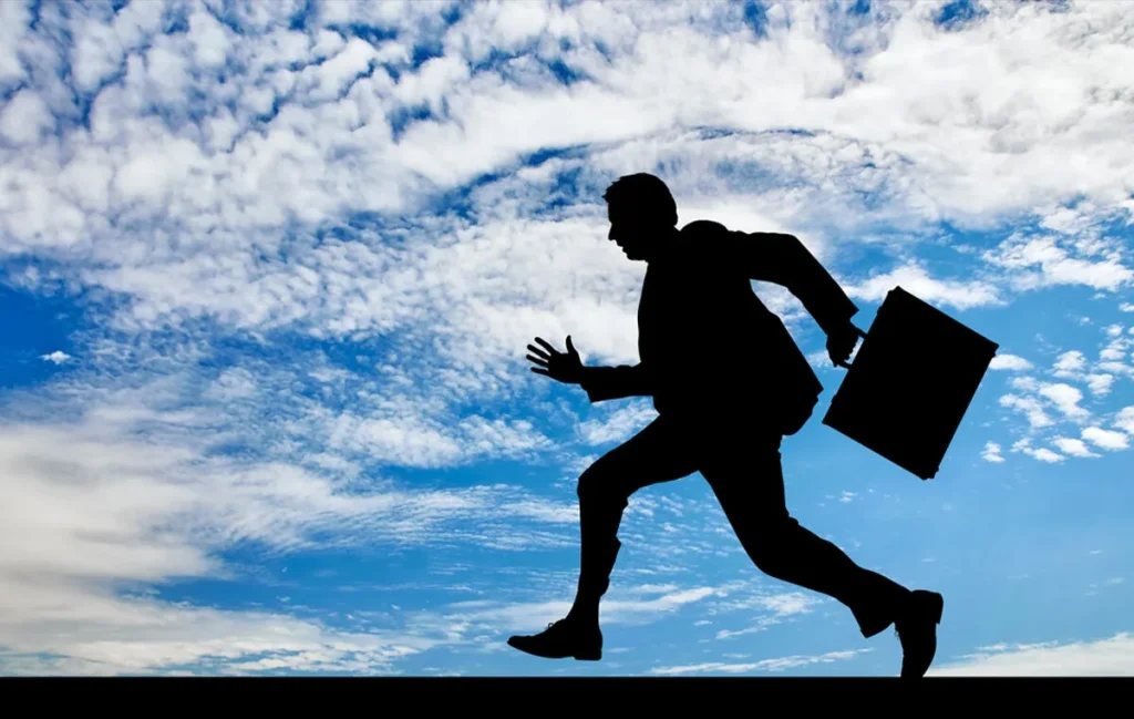 Business leader running fast to symbolize traction in business and the pursuit of sustainable growth