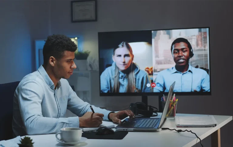 Executive working with a remote-first company team on video call