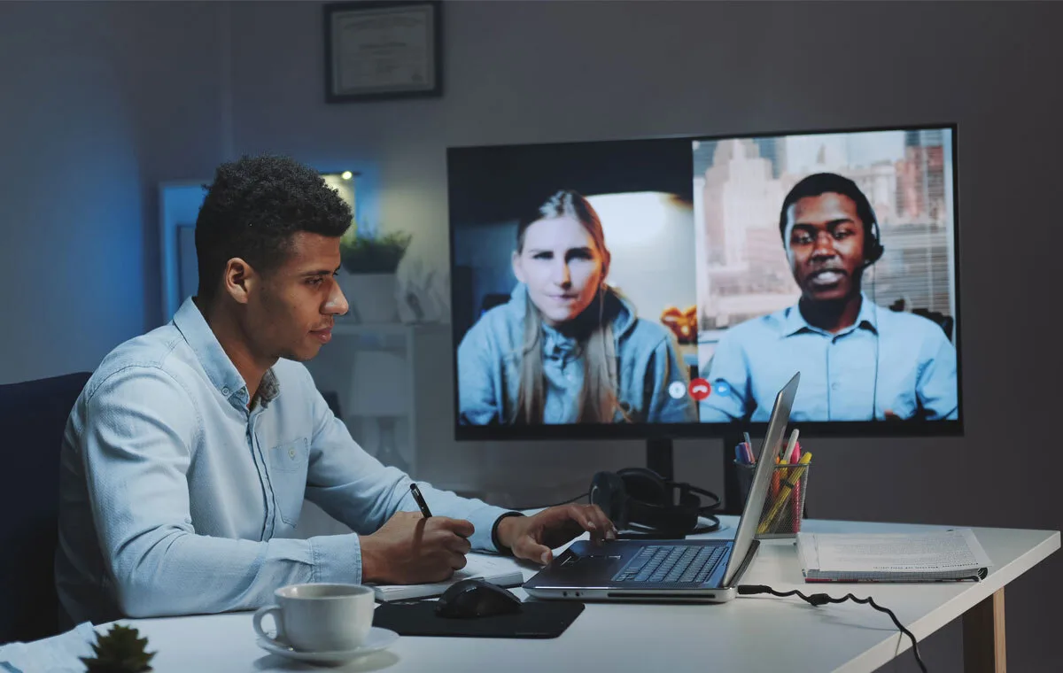 Executive working with a remote-first company team on video call