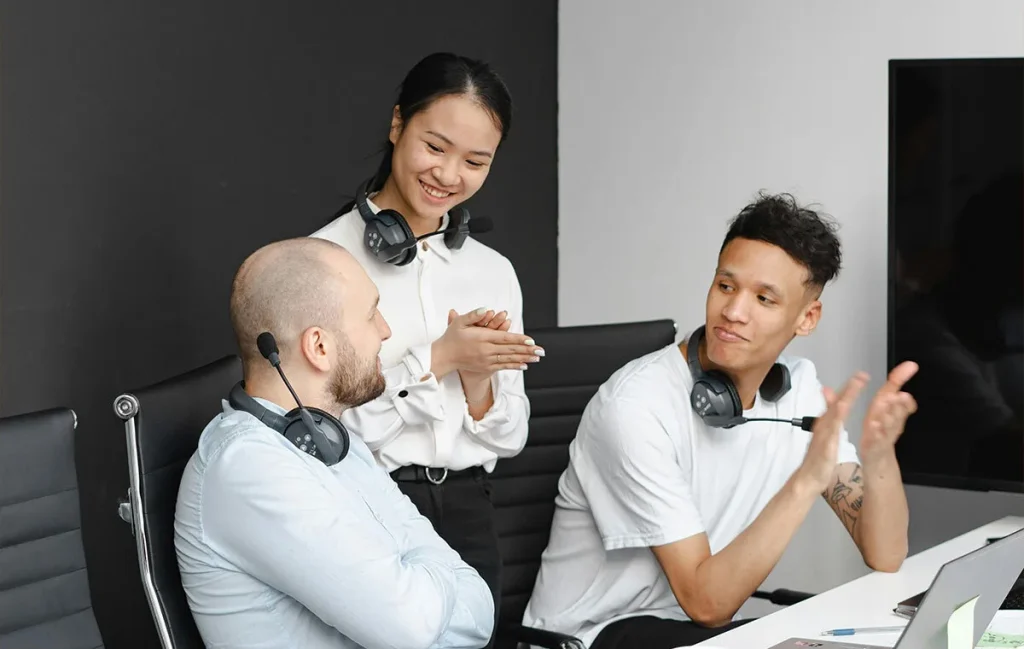 Global communication team collaborating across different time zones during a remote meeting