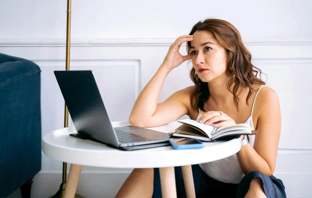 Remote worker experiencing burnout due to workload pressure and lack of work-life boundaries