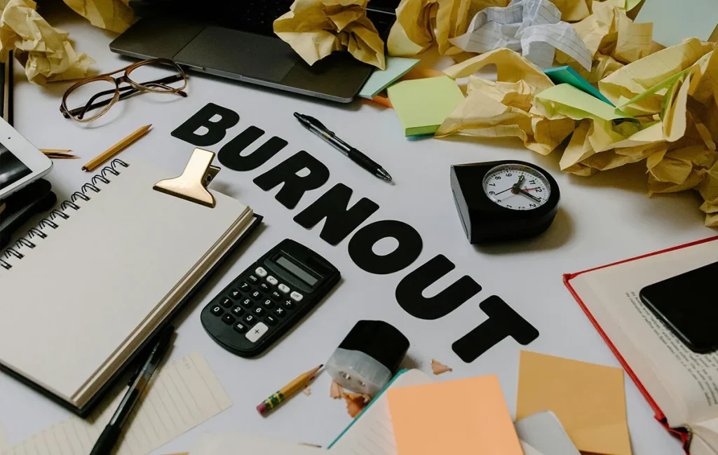 Common causes of remote work burnout including communication overload and weak delegation