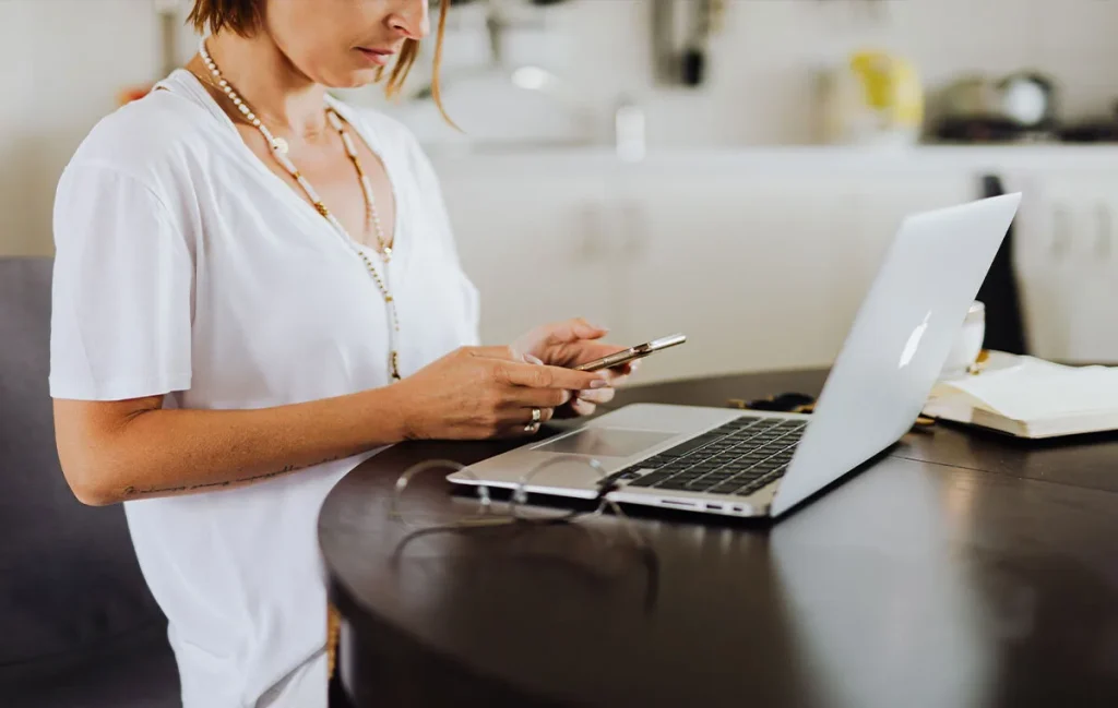 Remote work community member staying connected through digital communication while working remotely