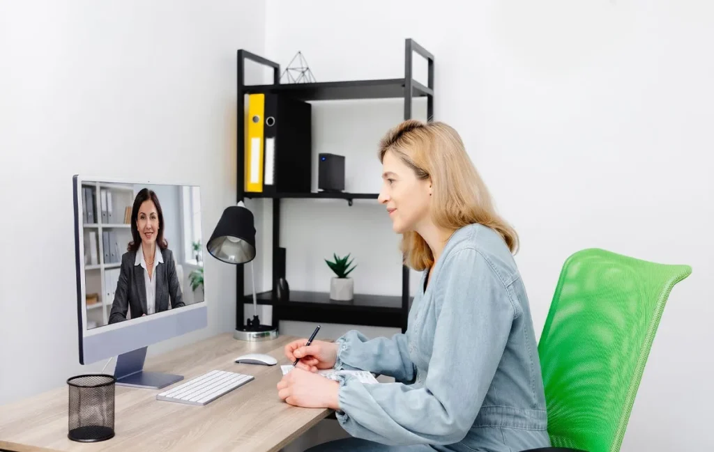 A professional interview or onboarding scene highlighting the essential steps and questions needed when law firms decide to hire a paralegal for remote legal support and document handling.